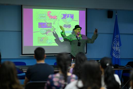 A scientist delivers a lecture.